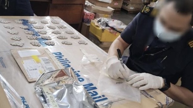 Authorities discover suspected ecstasy valued at P855,100 in a package at the Surface Mail Exchange Department in Port Area, Manila on Thursday, June 26, 2025. (Photo from the Philippine Drug Enforcement Agency)