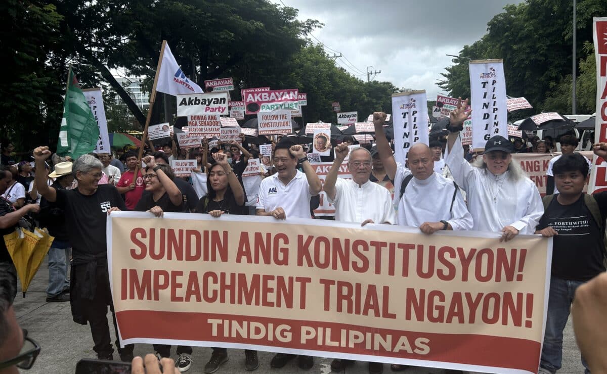 Protesters stage a rally in front of the Senate building in Pasay City on Wednesday, June 11, 2025, calling out the senator-judges for remanding the articles of impeachment against Vice President Sara Duterte to the House of Representatives. — Photo by Zacarian Sarao