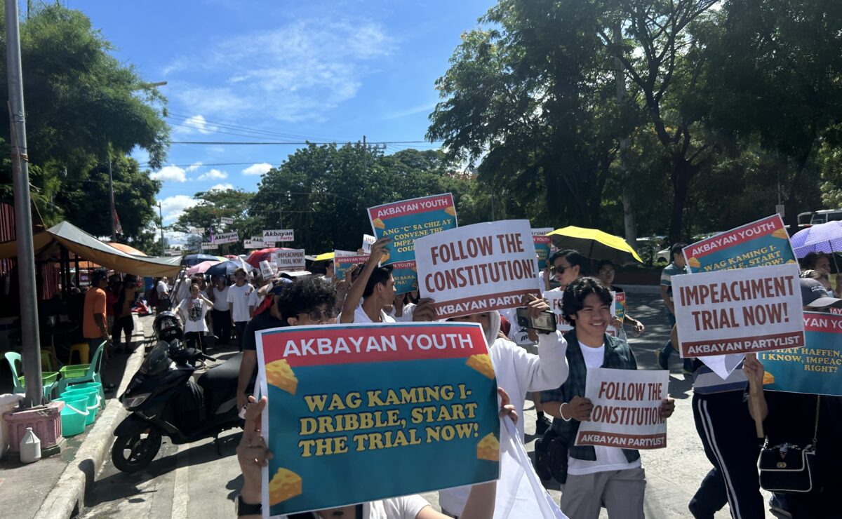 LOOK: Protesters urge Senate to proceed with Duterte impeachment trial