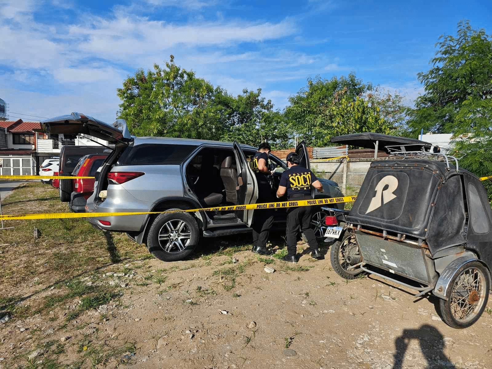 Another suspect in killing of policewoman, son yields to cops