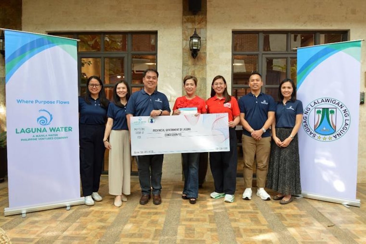 PHOTO: Sol Aragones with Laguna Water officials