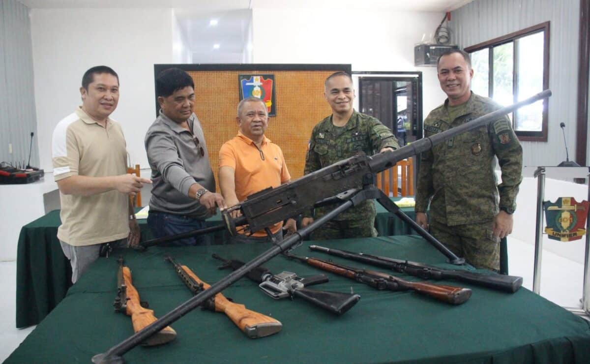 Ampatuan Mayor Rasul Sangki, Shariff Aguak Mayor Akmad Ampatuan, Sultan sa Barongis Mayor Allandatu Angas Sr., 6thID commander Brig. Gen. Ricky Bunayog, and 601stIB commander Brig. Gen. Gremel Brual pose with the high-powered firearms that local officials turned over to the military in Maguindanao del Sur on Saturday, Sept. 12, 2026. (Photo from 601st Infantry Brigade)