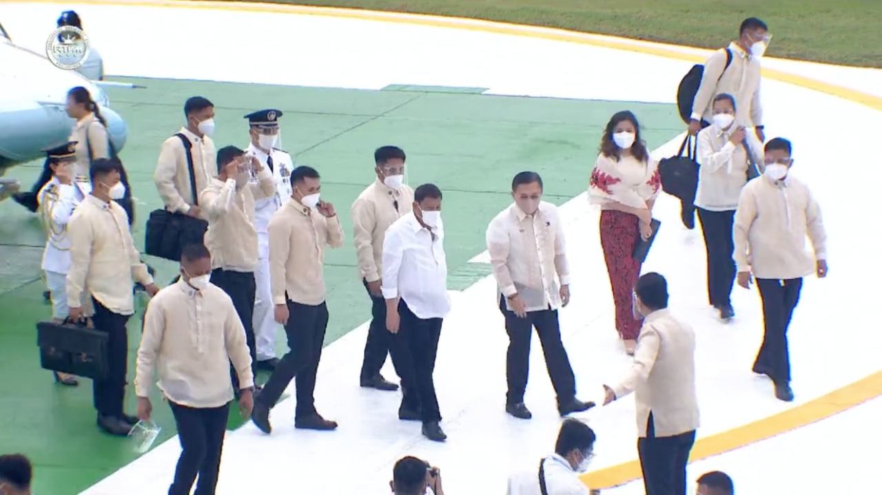 President Rodrigo Duterte and his common law wife Honeylet Avanceña arrive at the Batasan Complex for his final Sona.