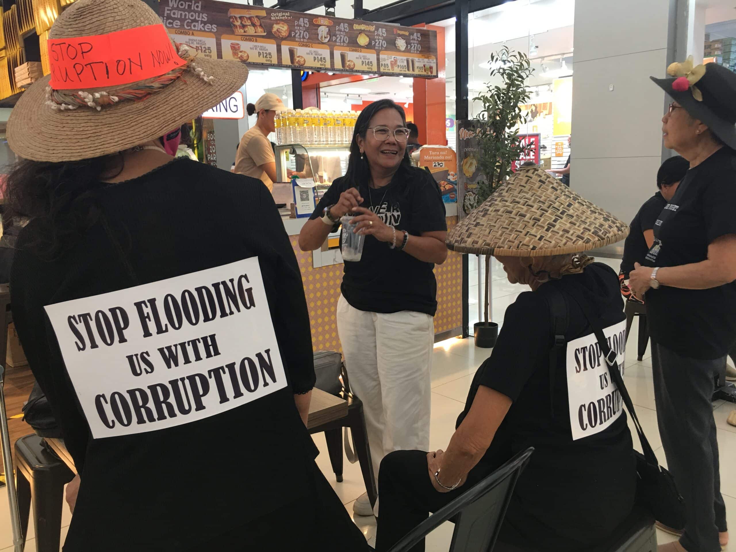 Four senior women launch creative protest vs corruption at a mall