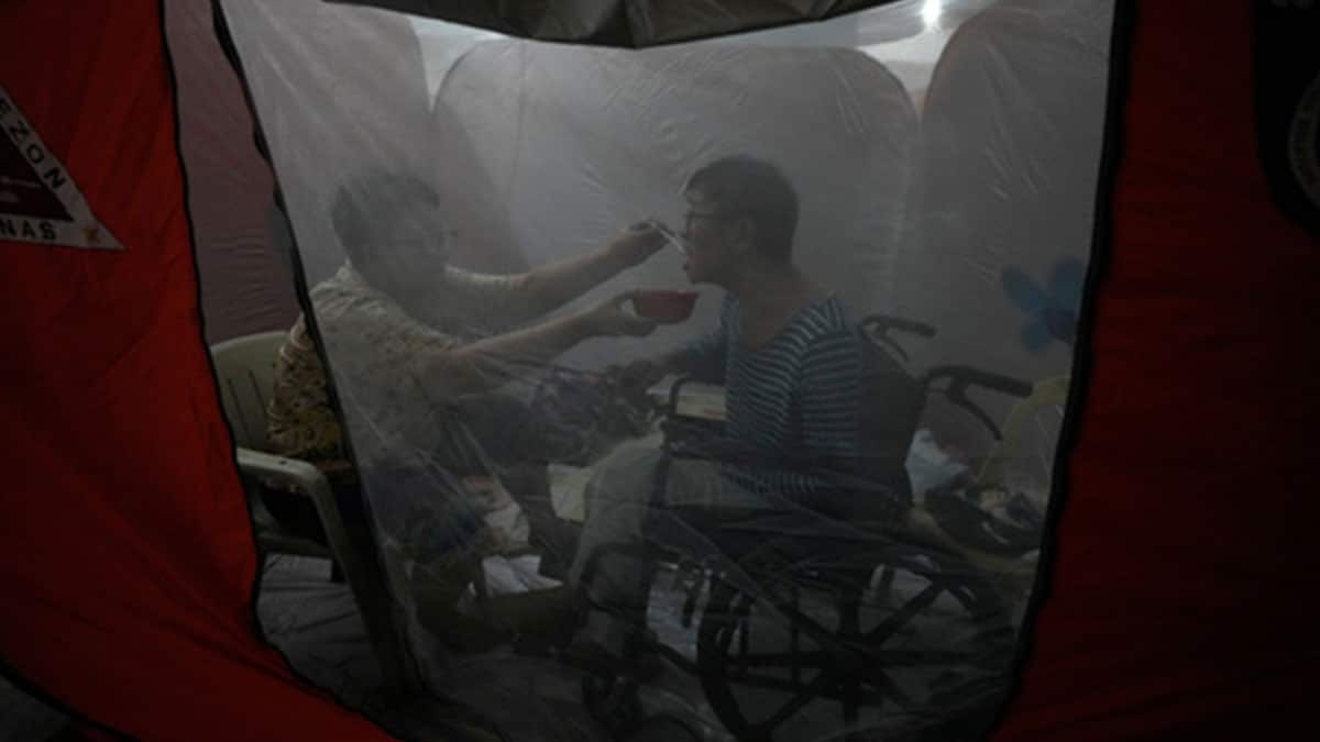 Tenderness trumps chaos inside crowded QC evacuation center